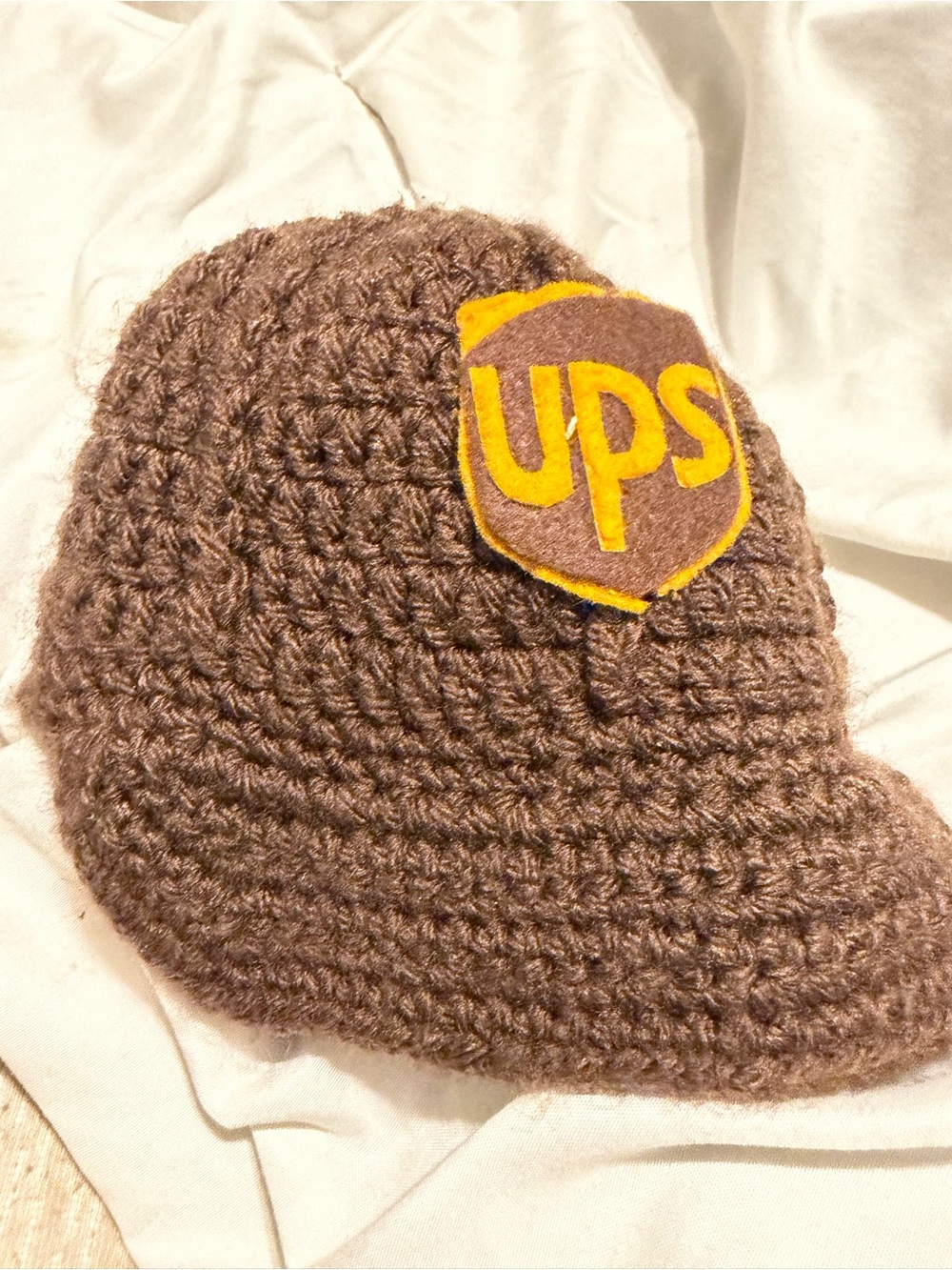 Kids Brown Knit Cap with Yellow Logo Patch